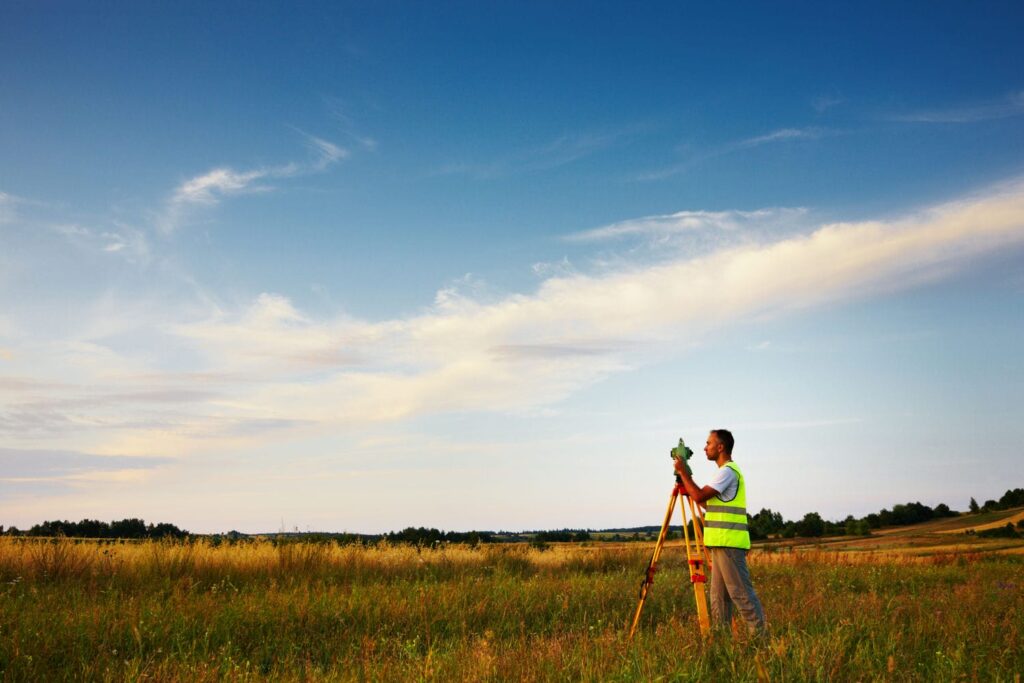 land surveyor performing site survey