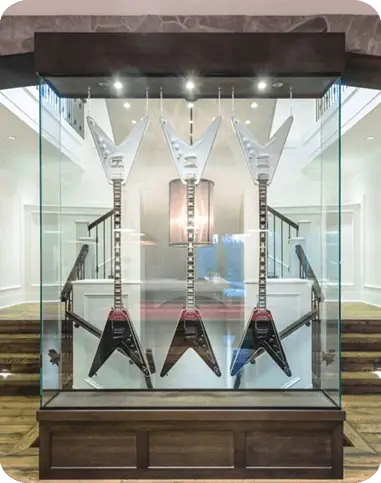 Glass guitar display case built into Chad Kroeger's custom home