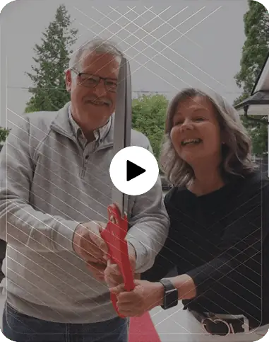Versa Homes clients cutting the ribbon at their new custom home, video testimonial