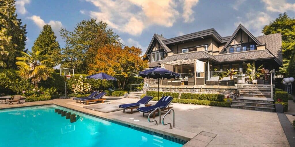 custom home in burnaby with expansive outdoor space and pool