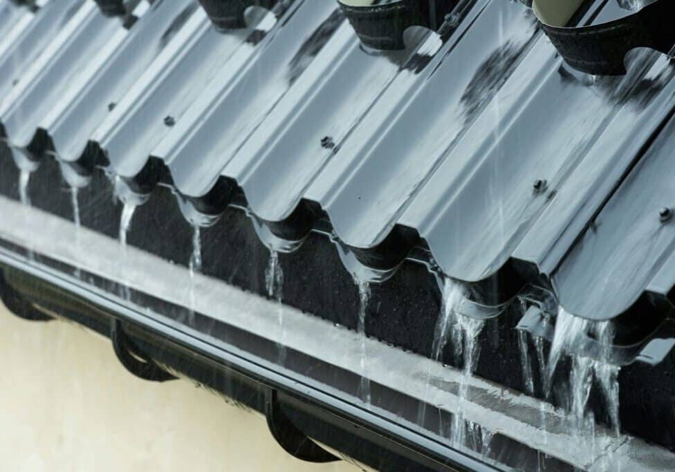 rain water flowing down roof in lower mainland bc